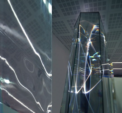 CARLO BERNARDINI, LIGHT WAVES 2008; Prismi in vetro stratificato, fibre ottiche, superficie olf, videoproiezione, audio mt h 3,40x8,50x2, Brindisi, Aeroporto del Salento.