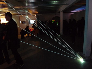 Carlo Bernardini, Matter is the Vacuum 2011, installazione in fibre ottiche, mt h 4x10x6. Kinetica Art Fair, Ambika P3, University of Westminister, London.