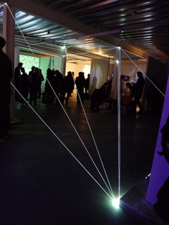 Carlo Bernardini, Matter is the Vacuum 2011, installazione in fibre ottiche, mt h 4x10x6; Kinetica Art Fair, Ambika P3, University of Westminister, London.