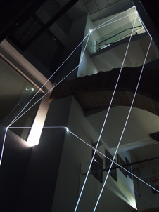 CARLO BERNARDINI, PERMEABLE SPACE 2008; Fiber optic installation, feet h 44x11x9. Valencia, La Nau - Universidad de Valencia.