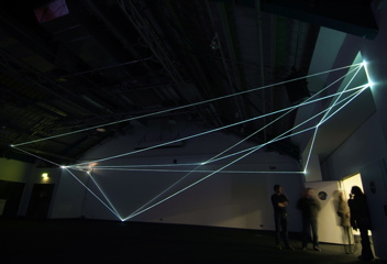 Carlo Bernardini, Drawing of the Vacuum 2011, optic fibers installation, mt h 5x20x10; Kinetica Art Fair, Prewiew - The Arc Show, Business Design Centre, London.