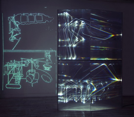 CARLO BERNARDINI, FANTASMA DI DUCHAMP 2009, Fibre ottiche, plexiglass, superficie OLF e videoproiezione, cm h 262x138x40. Museo d’arte, Villa Ciani, Lugano.