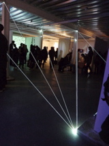 Carlo Bernardini, Matter is the Vacuum 2011, installazione in fibre ottiche, mt h 4x10x6; Kinetica Art Fair, Ambika P3, University of Westminister, London.