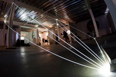 Carlo Bernardini, Matter is the Vacuum 2011; installazione in fibre ottiche, mt h 4x10x6. Kinetica Art Fair, Ambika P3, University of Westminister, London.