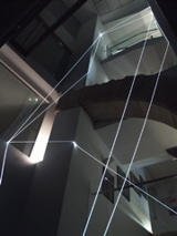 CARLO BERNARDINI, PERMEABLE SPACE 2008; Fiber optic installation, feet h 44x11x9. Valencia, La Nau - Universidad de Valencia.